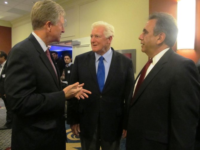 Brian Moran, former chairman of the Democratic Party of Virginia with U.S. Rep. James Moran (D-8) and Fred Shwaery of Vienna, a member of the Arab American Democrats of Virginia at the 24th annual Arab American Candidates’ Night Dinner held at the Tysons Corner Marriott on Sept. 30.
