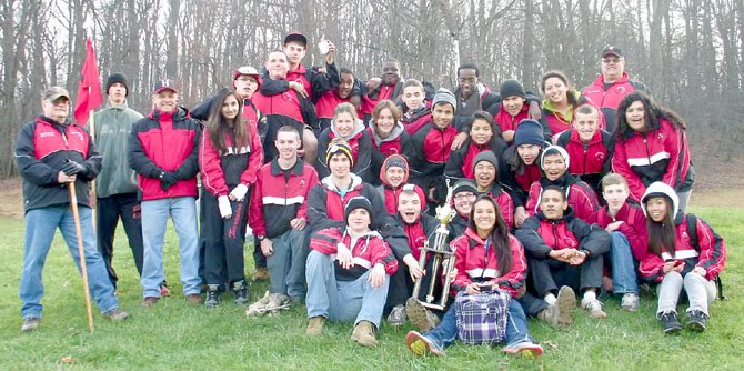 Herndon High's NJROTC cadets celebrate earning fourth place at the Area Five Orienteering Championship.