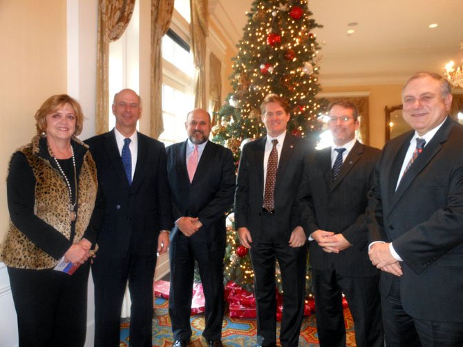 The Chamber Board welcomes Dr. Gerald Gordon, Fairfax County Economic Development Authority, to the AM Network Breakfast: Jane Gandee, ServiceMaster of Alexandria; Gordon; John Barsa; Jay McConville, Lockheed Martin; Michael Gailliot, Century 20 New Millenium, and Tony Riolo, Burke & Herbert Bank.