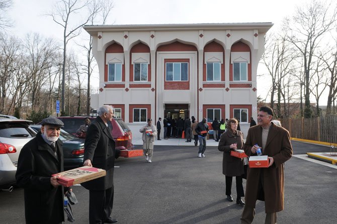 Guests leave in newly opened Islamic Circle of North America-VA(ICNA-VA) mosque after opening ceremonies last Saturday afternoon. The Mount Vernon mosque, a million-dollar-project, features five Islamic arches.