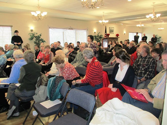 Vienna resident Lisa Arlt Escoto (standing), was one of nearly 200 residents to attend Saturday’s town hall meeting hosted by Senator Chap Petersen (D-34) and Delegate Mark Keam (D-35).  