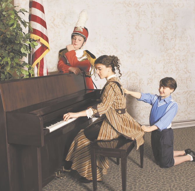 Jake Land of Potomac is cast as Harold Hill in Bravo@Kat theatre for young artists’ production of “The Music Man” at the Olney Theatre Center this weekend. Josie Weinberg is Marian Paroo and Cole Edelstein is Winthrop Paroo.