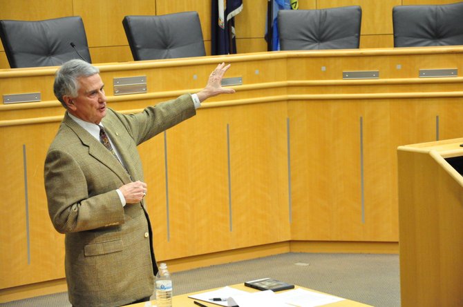 Del. Tom Rust (R-86) addresses the current General Assembly session at the Herndon Municipal Center Saturday, Jan. 12. 