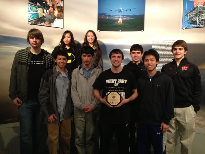 Local students competed in the ZERO Robotics Challenge at the Massachusetts Institute of Technology (MIT) earlier this month. Front row, from left, are Peter Jablonski, Alexander Fang, Jesse Pai, Justin Schumacher, Andrew Kee; second row, from left, are Diana Yin, Amy Lin, Samuel Platt and Eric Rosenberg. 