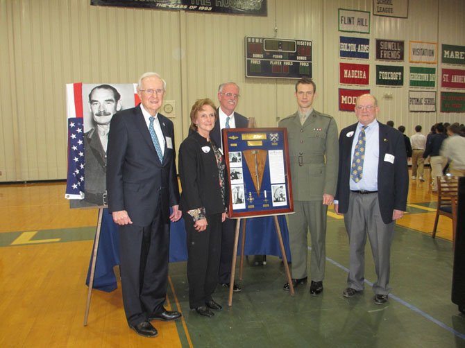 Skip Coston, chairman, Flint Hill School Board of Trustees; Society Curator Judith Shoemaker; Flint Hill School Headmaster John Thomas; British Royal Marine Major Simon Tucker, representing British Embassy and president of the Ferguson-Warren Society; and Jerry Jasper, presenting Colonel Alan Ferguson-Warren’s regimental dagger to Flint Hill School on Friday, Jan. 18.