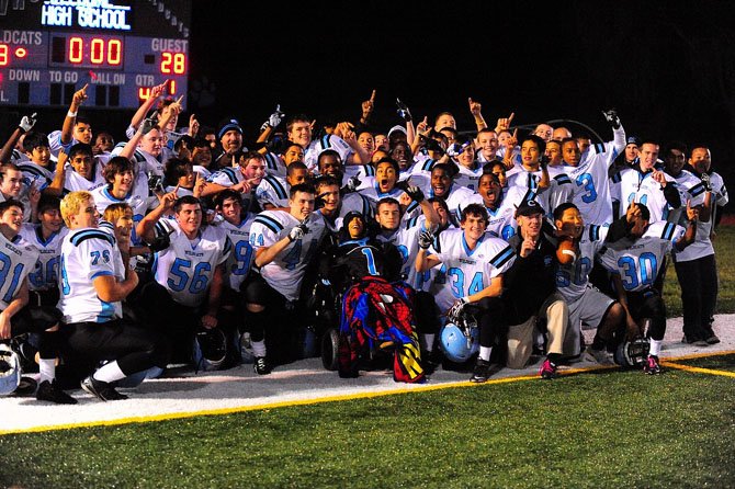 Juwaan Espinal and Centreville High’s jubilant, undefeated freshman football team celebrate the season together.