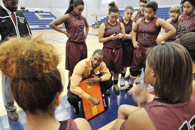 Mount Vernon girls' basketball coach Courtney Coffer talks to the Majors during a Jan. 17 contest against Washington-Lee.