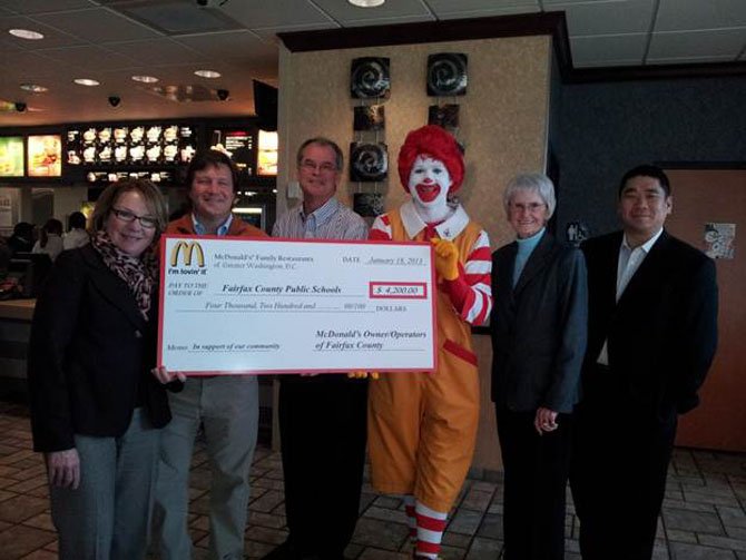 McDonald’s of Greater Washington, D.C. donated $4,200 to Fairfax County Public Schools. From Left to Right: Christine Donohue (chief of staff, FCPS), Jay Garant (coordinator, Business and Community Partnerships—FCPS), Jim Van Valkenburg (McDonald’s owner/operator), Ronald McDonald, Neva Van Valkenburg (McDonad’s owner/operator), Kyu Rhee (McDonald’s owner/operator). The owners/operators pictured own restaurants in Fairfax County and contributed to the total donation.