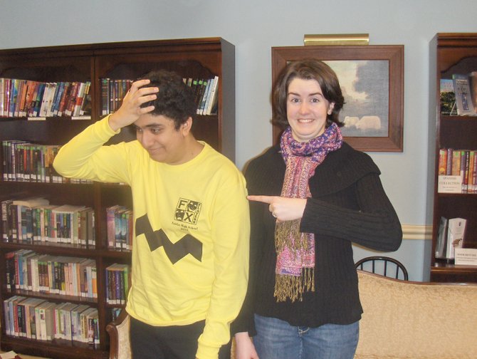 Charlie Brown (Shakil Azizi) is teased by Lucy (Isabelle Baucum).