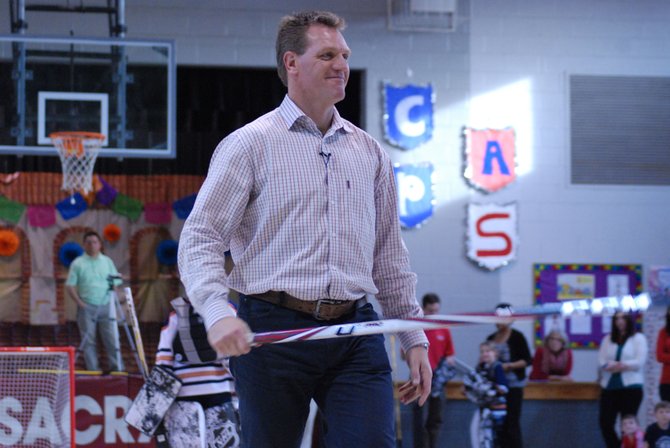 Assistant coach of the Washington Capitals hockey team Calle Johansson met with students at Blessed Sacrament School on Dec. 12.