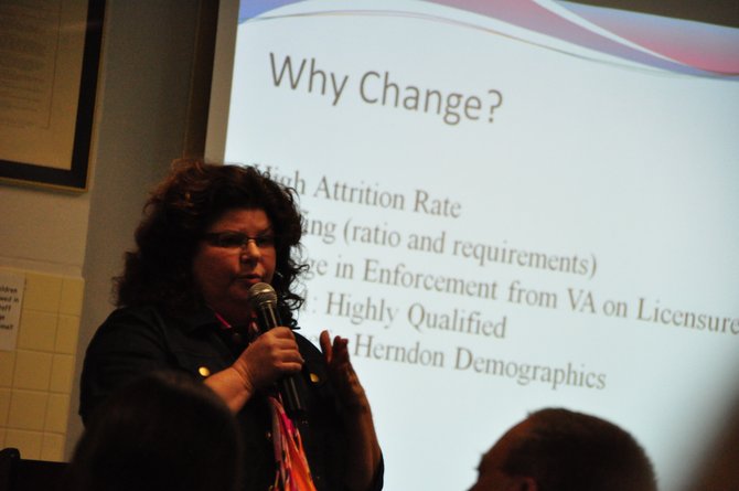 Ann Gwynn, principal of Herndon Elementary School, speaks to parents about the possible end of the school’s French Immersion Program Wednesday, Jan. 30. 