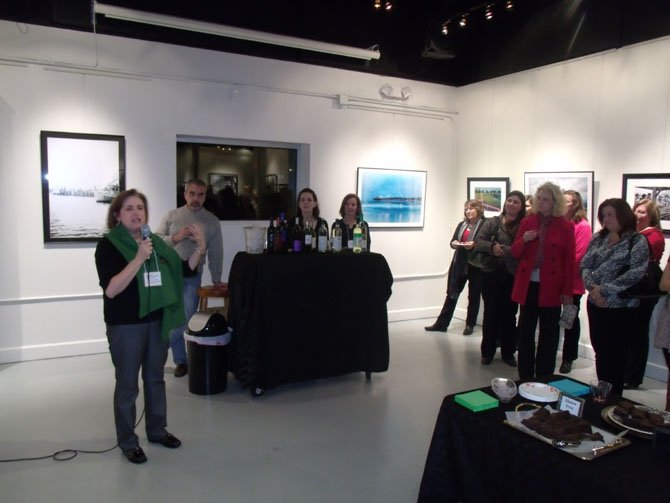 Catherine Powers speaking at the exhibition.