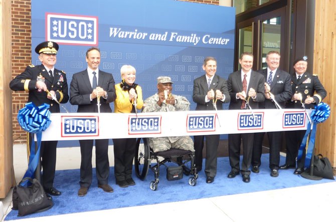 The USO Warrior and Family Center at Fort Belvoir officially opened Feb. 5. Participating in the ceremony are: Lt. Gen. William Troy, Kuwaiti ambassador Salem Abdullah Al-Jaber Al-Sabah, Elaine Rogers, Col. Gregory Gadson,  Sloan Gibson, Wes Bush, Ed Reilly and Gen. Frank Grass.