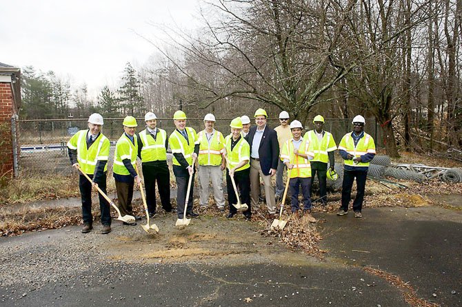 From left, Craig Carinci, director of storm water planning, DPWES; John Dargle Jr., director, Park Authority; Brice Kutch, Bowman Consulting Group; Braddock District Supervisor John Cook, Fairfax County; Paul Thaler, project inspector, Utilities Design and Construction Division, DPWES; Tony Vellucci, Braddock District representative to the Park Authority Board; Roy Waugh, Bowman Consulting Group; Dave Bowden, director, Planning & Development, Park Authority; Jose Soto, Sagres Construction Corporation; Yudhie Brownson, project engineer, Utilities Design and Construction Division, DPWES; Elfatih Salim, Water-quality Benefits, DPWES; and Joseph Adzovie, senior engineering inspector, DPWES-UDCD.