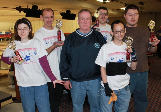 Five Special Olympians receive the Outstanding Performance Awards from FAS President John Carney.