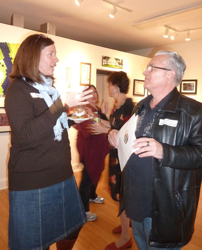 Diane Ruggiero and artist Eric Nelson.