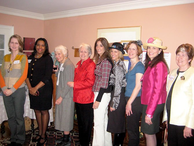 From left, school board member Pat Hynes; Del. Charniele Herring; former State Senator Patsy Ticer; former Board of Supervisors Chair Kate Hanley; Del. Eileen Filler-Corn; Virginia Million Mom March Chair Martina Leinz; Fairfax County Democratic Committee Vice Chair South Ruth Miller; school board member Tammy Kaufax, former State Senator Mary Margaret Whipple.