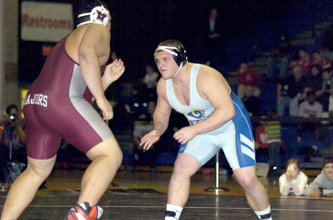 Robinson’s Jake Pinkston won the 285-pound title at the Northern Region wrestling meet on Feb. 9 at Hayfield Secondary School.