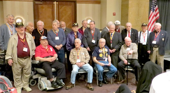 Iwo Jima veterans  gather for a group photo Feb. 16 during a reunion marking the 68th anniversary of the battle.