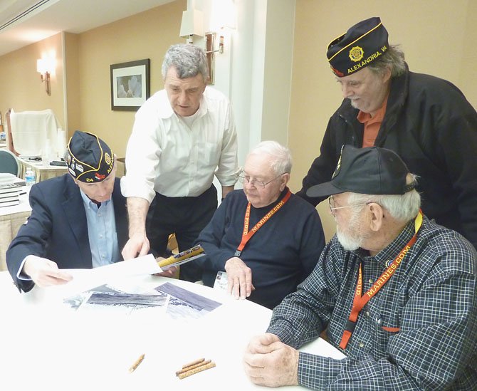 Members of American Legion Post 24 in Old Town visit with WWII veterans during a reunion of Iwo Jima survivors in Arlington Feb. 15. Shown are Henry Dorton, Commander Bill Aramony, Bob Rigger, Jim Glassman and Ira Rigger.