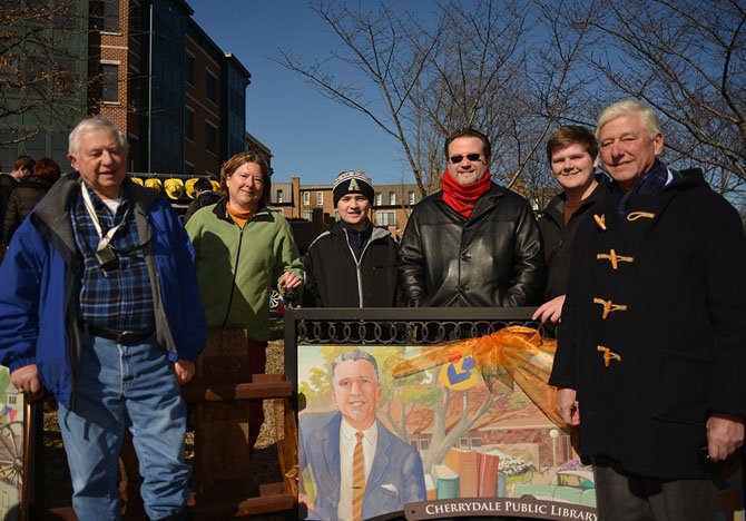 From left: Brad Lampshire, Kristine Lampshire DeFreitas, Nathan Lampshire, Greg Lampshire, Jared Lampshire, and Geff Lampshire — all descendants of Harvey Lampshire, depicted on the Cherrydale Library mural.