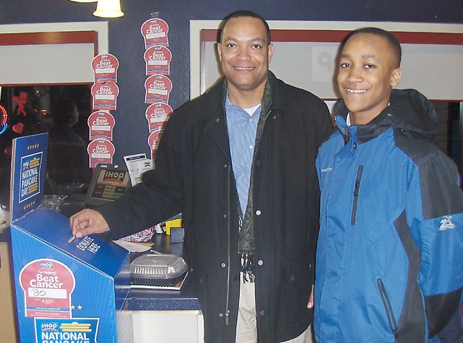 Little Rocky Run’s Brandon Brown and son Myles are happy to contribute to LLS during the Centreville IHOP fundraiser.