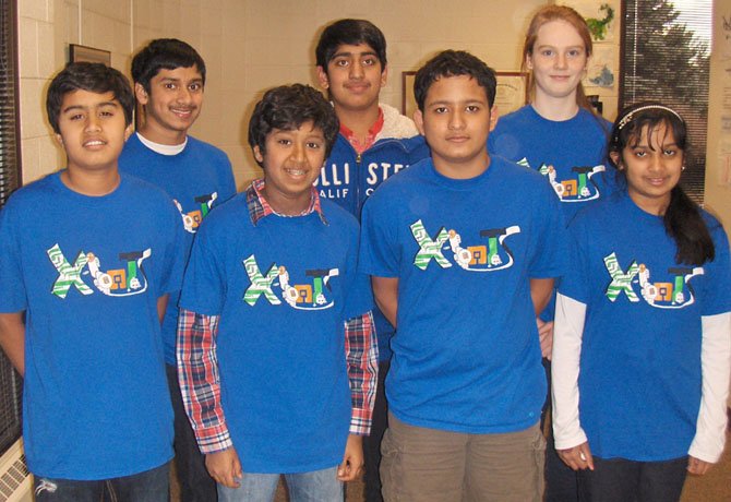 Back row, from left, are X-BOTS team members Nikhil Chintada, Satish Venkatesan and Sarah Maxseiner; and (front row, from left) Ahan Shah, Sidharth Rampally, Rishabh Venketesh and Anoushka Chintada.