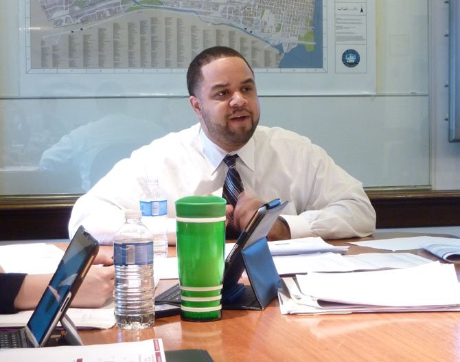 City Manager Rashad Young reviews his proposed 2014 $626.6M budget during a media briefing Feb. 26.