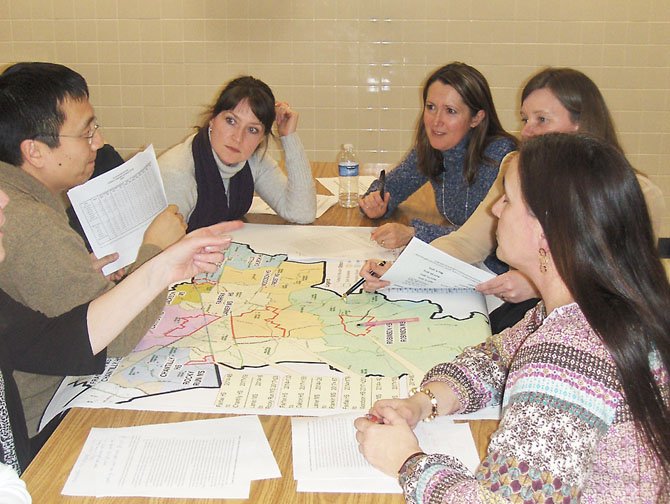 Parents discuss the various boundary-change options.
