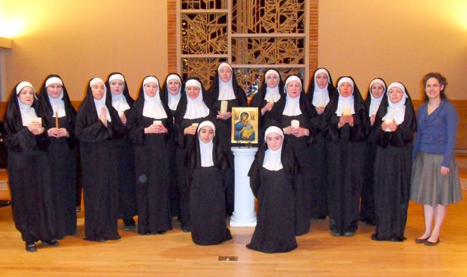 “Suor Angelica” ensemble in rehearsal. In the photo standing to the right not in “habit” is Riverbend Opera Music Director Molly A. Khatcheressian.