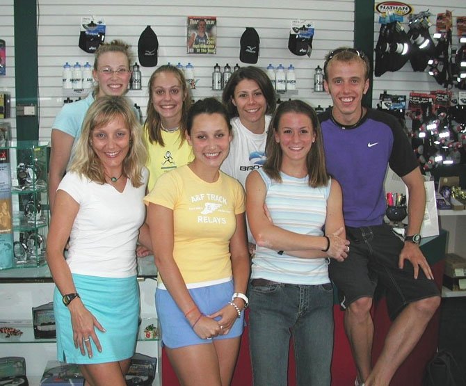 Back row, from left: Michelle Hart, Nicole Maier Bauers, Molly Raba Bahn, Alan Webb. Front row: Lesley Cranshaw, Dorothy Thoburn Beal, Claire Wood.