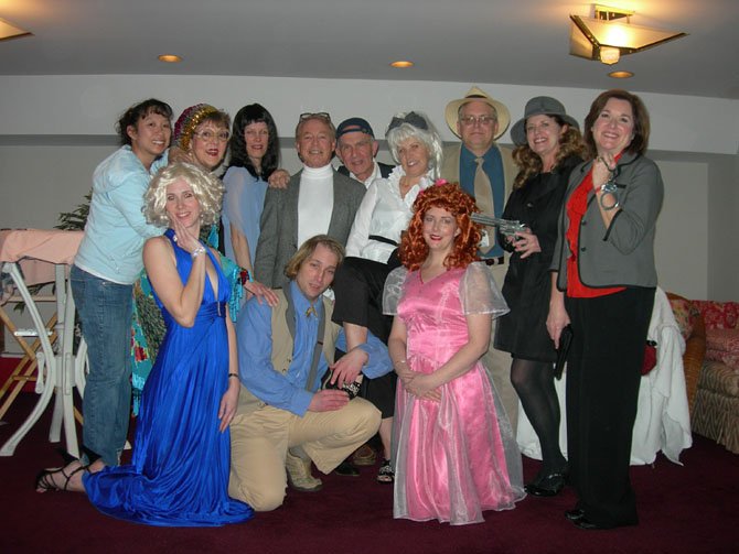 Cast photo: (standing, from left) Director Charlotte Yakovleff, Helen Rusnak, Lynne Strang, Charles Hoffman, Fred C. Lash, Jolanda Janczewski, James Manchester, Terri Grimes-Marin and Teri Pierce; (kneeling, from left) are Stephanie Lawrence, Eric Rogotsky and Nichole Klocke de Rodriguez. 
