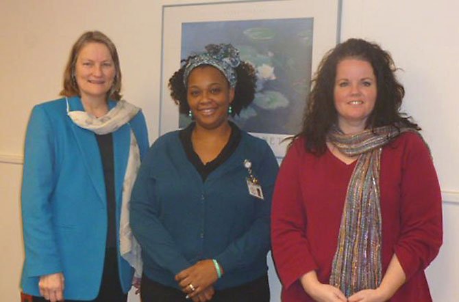 Torria Baker, Bryant Early Learning Center director (center), with Shirley Marshall, UCM executive eirector (left), and Elizabeth McNally, UCM deputy director.