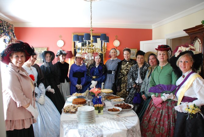 Historic company celebrating Women’s History Month are (clockwise from left) “Alice Roosevelt Longworth” (Elaine Flynn), “Confederate Spy Laura Ratcliffe” (Amy Beechler), “Freida Fromm-Reichmann” (Karen Webber Gilat), “Widow Mary Todd Lincoln” (Phyllis Verhalen), “Cornelia MacDonald [wife of Confederate Colonel Angus MacDonald III, Winchester, Va.]” (Beverly Pelcher), “Anonymous Civil War Woman” (Sandy Michel), “Capt. Sally Thomkins” (Rosemary Thoburn), “Clarrika Dale Fleming” (Karen Lyddane), “Clara Barton” (Jenee B. Lindner), “Harriett Brice—Freed Woman of Color” (Marion Dobbins), “Mrs. Silas Burke aka, Hannah Coffer Burke” (Cindy Bennett), “Capt. Sally Louisa Thomkins” (Margaret Rowe) and “Suffragist Mrs. Robert ‘Mimi’ Walker” (Lynne Garvey-Hodge).