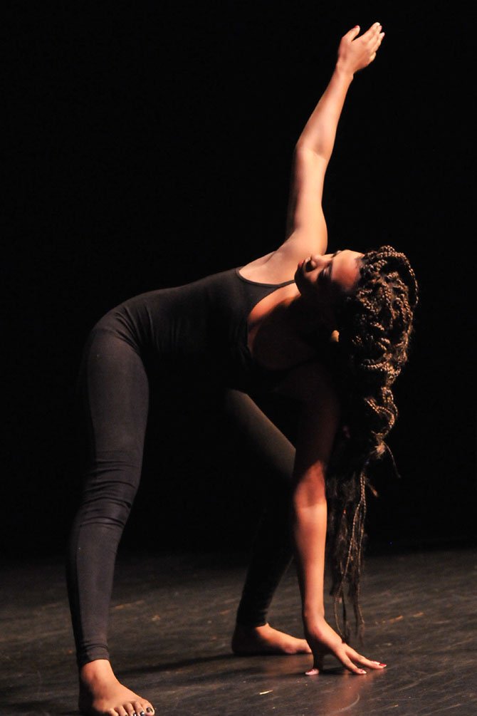 Jasmine Brown of the T.C. Williams Modern Dance Society performs in “Mourning/Morning.”
