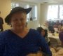 Debra Knight wears Kay Barnes’ hat, which she ...