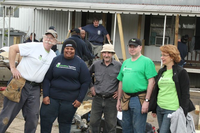 Volunteers for Rebuilding Together, the organization that coordinated the wheelchair ramp project,  work to improve safety and enable people to stay in their homes.  