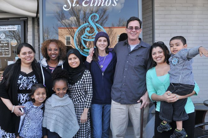 Dr. Roderic Brame and his wife Rachel pose for a photo outside of St. Elmo’s on Saturday afternoon, March 30, with friends, former students and their families. Pictured are Shamsun and Maisha Nahus, Shamso and Laila Mohamed, Shema, Rachel and Roderic Brame and Fatima and Aidan Sivirian.
