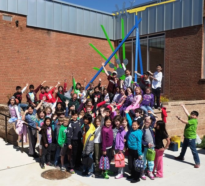 Last week, more than 300 Oakton Elementary students worked with artist Kevin Reese, a sculptor-in-residence, to design and build this high-flying, swirling mobile unveiled during a dedication ceremony at the school on Friday, April 5. 
