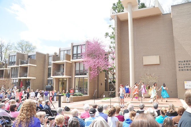 Members of the South Lakes High School production of “Xanadu” perform at the Reston Founder’s Day celebration Saturday, April 13. 