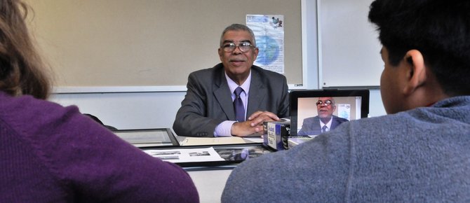 The Rev. James M. Kilby answers questions from students at Campbell Elementary School.