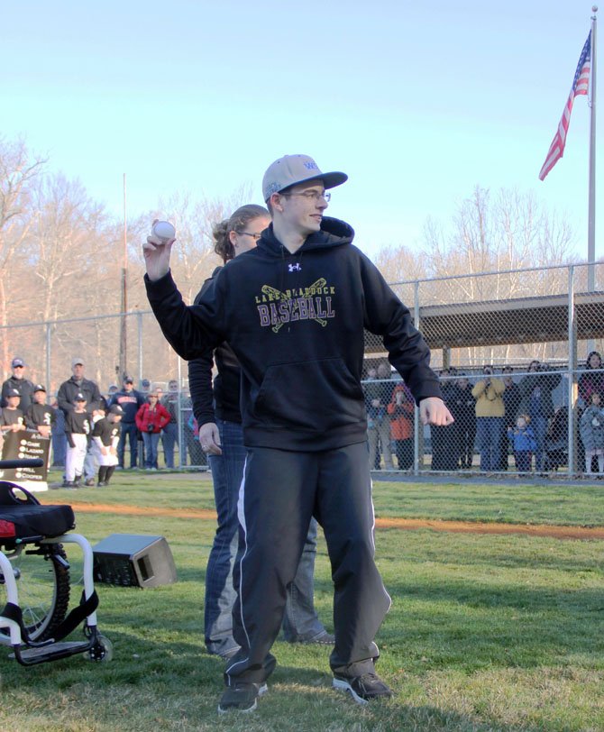 Nick Balenger throws out the first pitch during West Springfield Little League’s Opening Day Ceremony on Saturday, April 6, in front of 750 fans.
