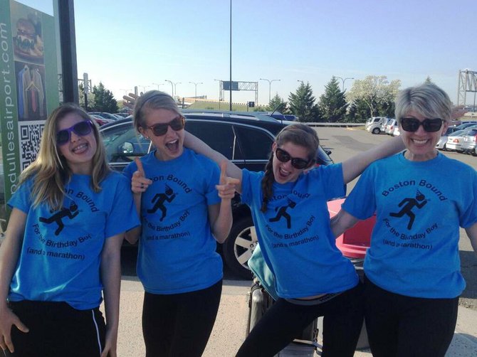 West Springfield High School student Christine Wittich, standing next to her mom Julie (far right), posted this Twitter photo of her family on Saturday, April 13, in matching shirts, ready to attend the Boston Marathon.
