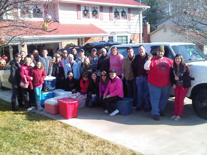 The 25th Project Team gathers on Christmas morning 2012, ready to deliver meals and presents to the homeless. Many members are from Burke Community Church. 
