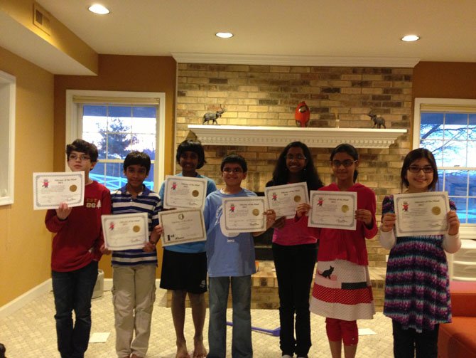 Students who received honors in the state competition are, from left, Arsh Siddiqui, Vishnudev Jeyaraj, Viraj Chegu, Ayush Viswanathan, Likhitha Addagatla, Rithika Murugesan and Ella Chandan.
