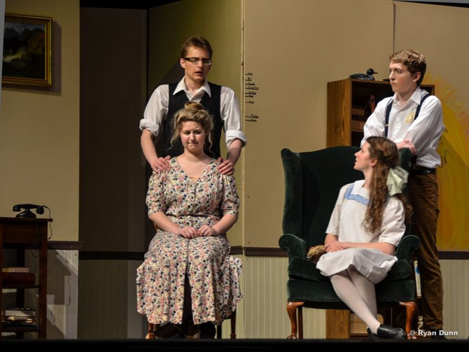 Standing, from left, Chris Hrozencik, Hunter Robinson;   seated, Cassie Sezymezk and Sarah Overton in Herndon High’s production of “Cheaper By The Dozen.”
