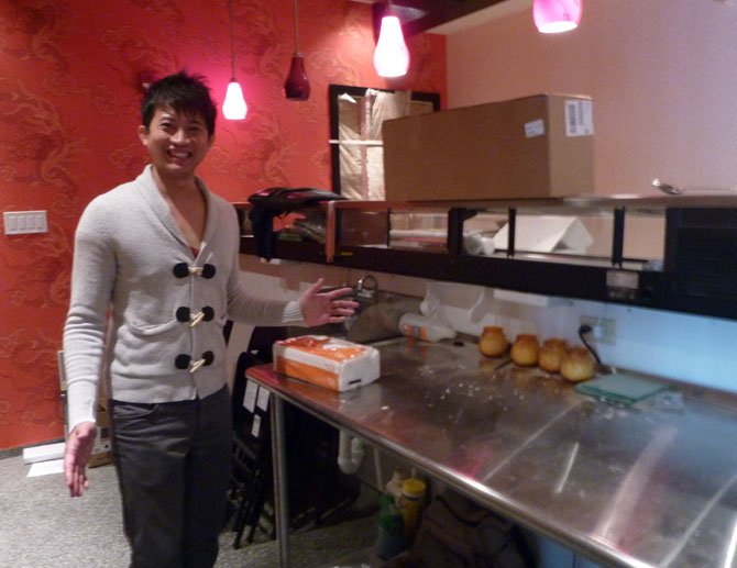 Sushi chef Saran “Peter” Kannasute shows off his future work space at the soon-to-open Sushi Bar in Del Ray.
