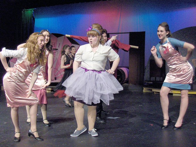 (From left) Rachel Ingle, Mady Hanton, Hannah Sikora and Katie Mahon-Kuzin rehearse a number from Robinson’s “Hairspray.”