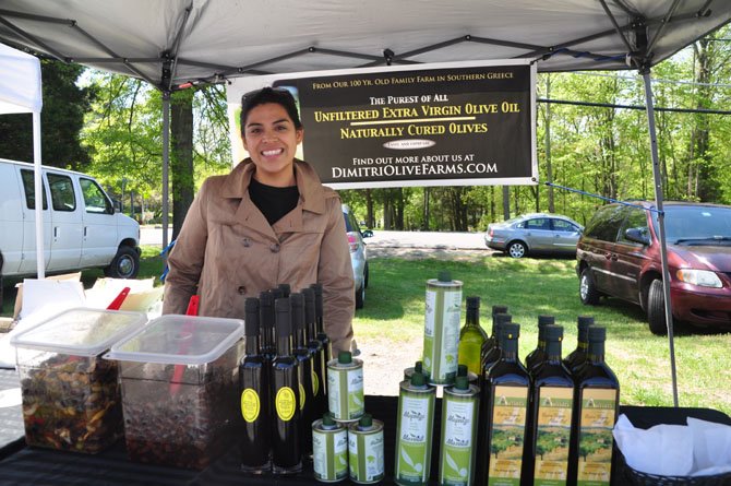 Cinthia Giannakos of Dimitri Olive Farms, which sells olive oil, olives and aged balsamic vinegar at the Great Falls Farmers Market. 