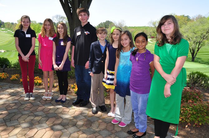 From left, Great Falls Elementary School students Caroline Stock, Laura Gersony, Sonia Toloczko, Alex Marjanovich, Will Kiser, Ana Grajdeanu, Elena Berrios, Muntaha Haq and Maddie Cross, winners in the annual Great Falls Friends and Neighbors poetry contest. Great Falls fifth grader Mary Kurbanov was also a winner, but was unable to attend the Friday, April 26, awards luncheon. 